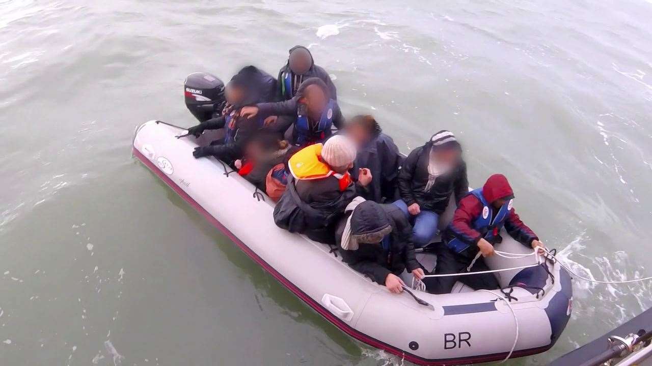 Bodyworn footage taken in November 2019 issued by the RNLI of lifeboat crews rescuing migrants in a dinghy at sea (RNLI/PA)