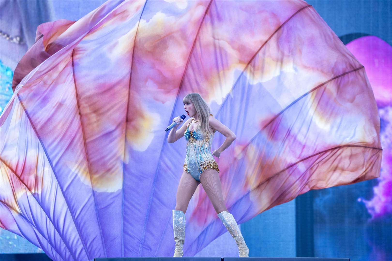 Fans watch Taylor Swift perform on stage (Jane Barlow/PA)