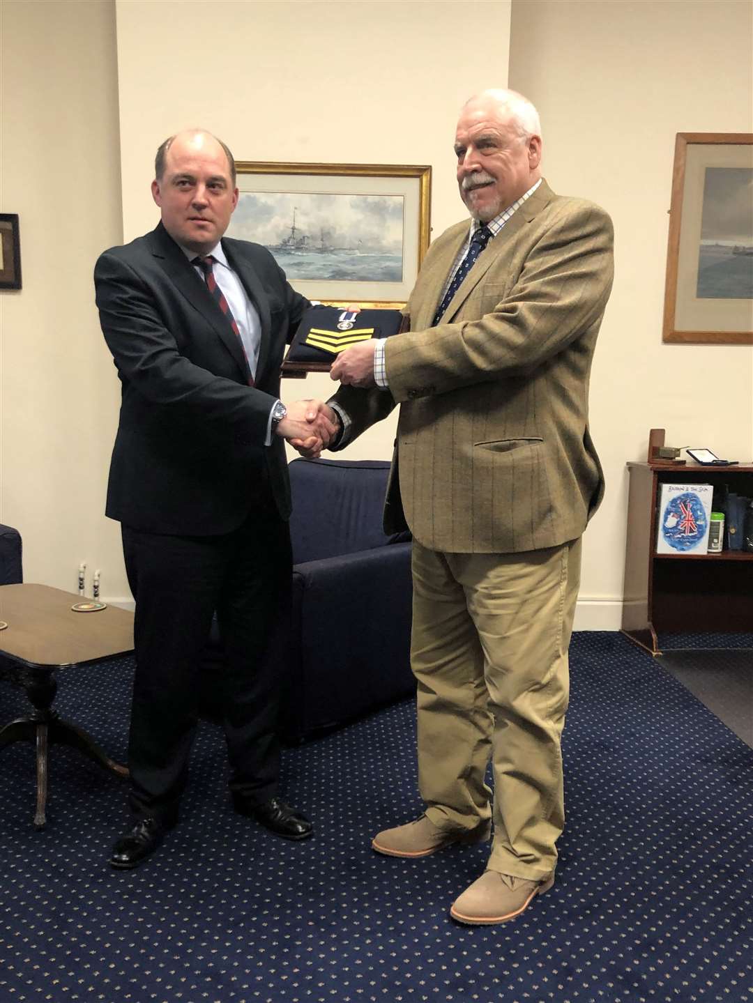 Joe Ousalice receives his medal from Defence Secretary Ben Wallace (Liberty/PA)