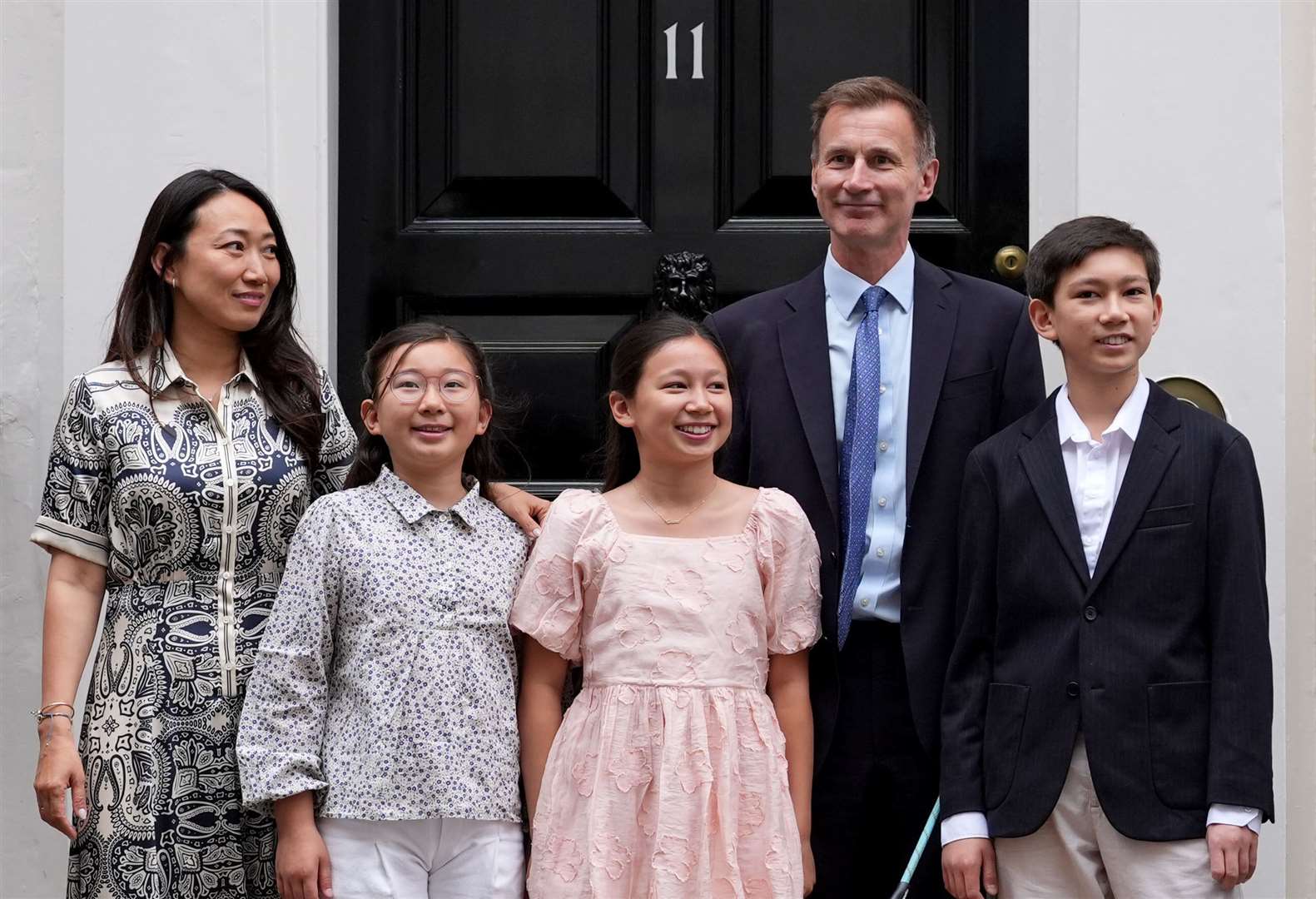 Jeremy Hunt with his wife, daughters and son as he departed No 11 on Friday (Lucy North/PA)