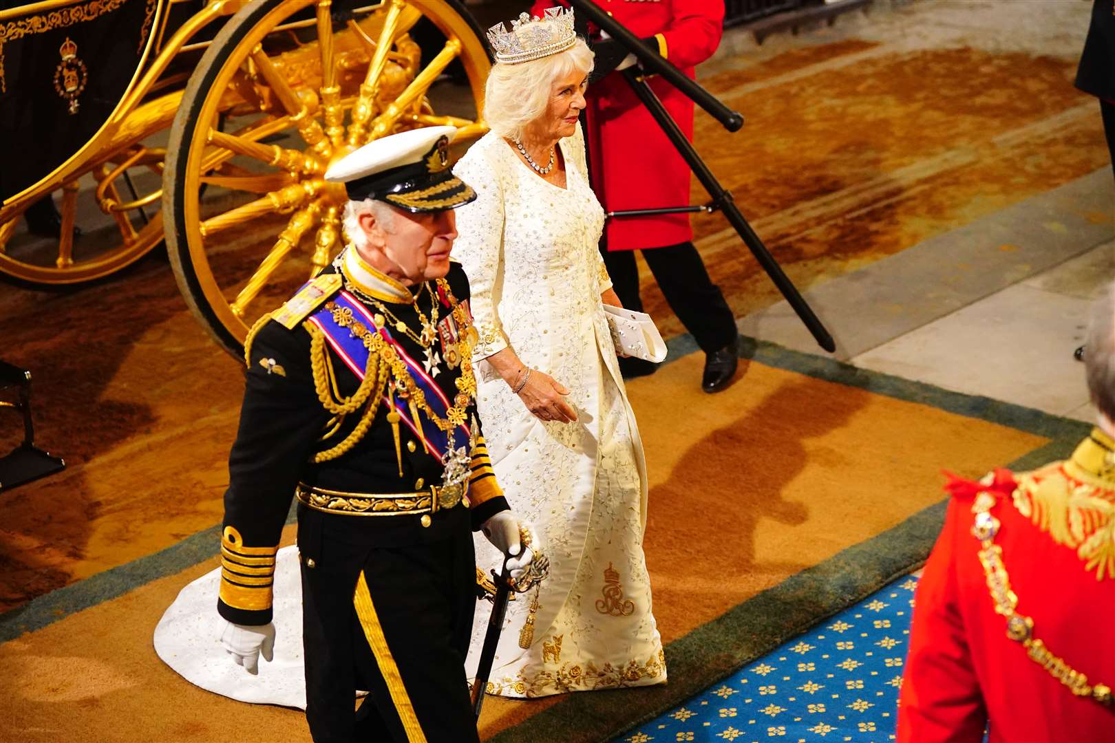 The King and Queen arrive at the Sovereign’s Entrance to the Palace of Westminster (Victoria Jones/PA)