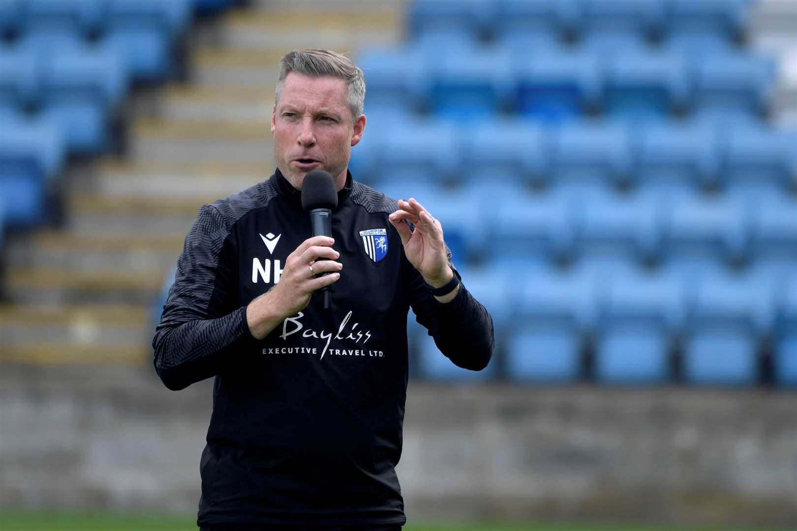 Manager Neil Harris talks with the fans ahead of the open session Picture: Barry Goodwin