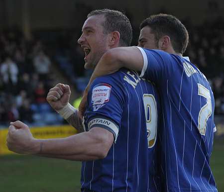 Danny Kedwell celebrates scoring Gillingham's second goal