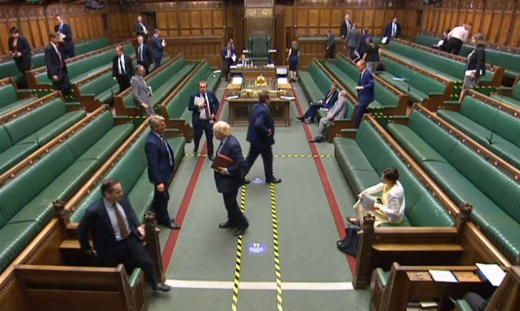 Boris Johnson walked over hazard tape on the floor in the Commons (House of Commons/PA)