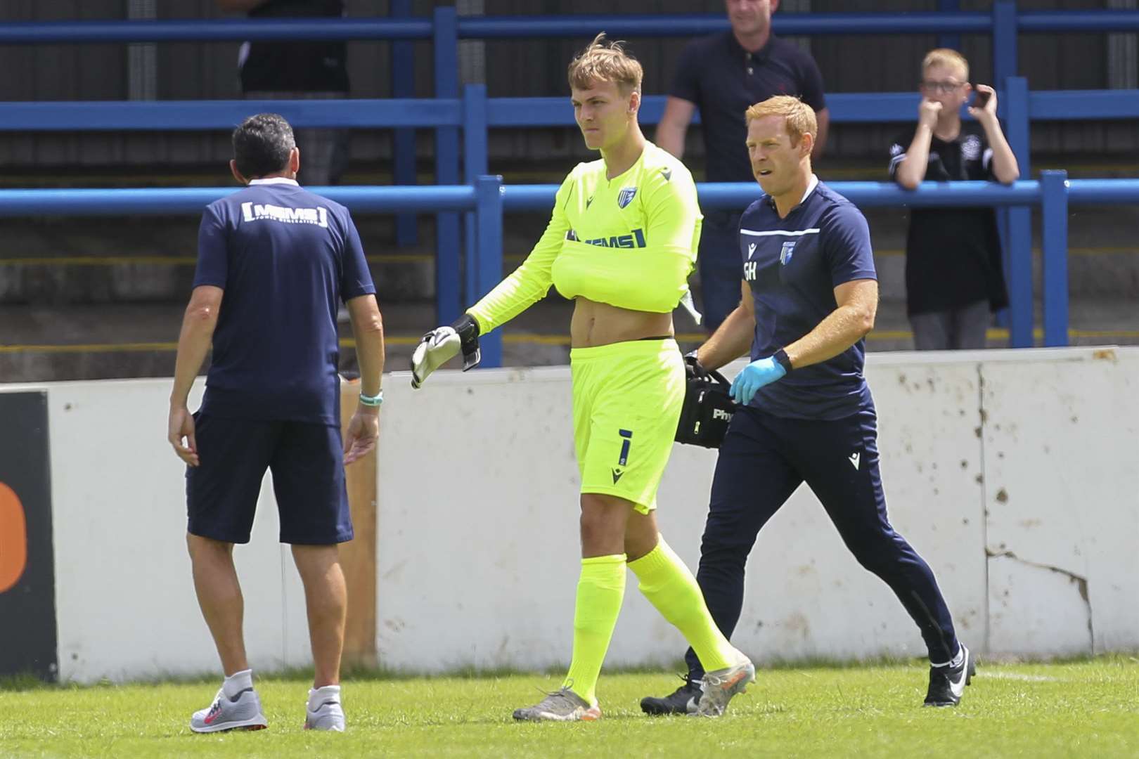 Gillingham's Ashley Maynard-Brewer goes off injured at Dover on Saturday Picture: KPI