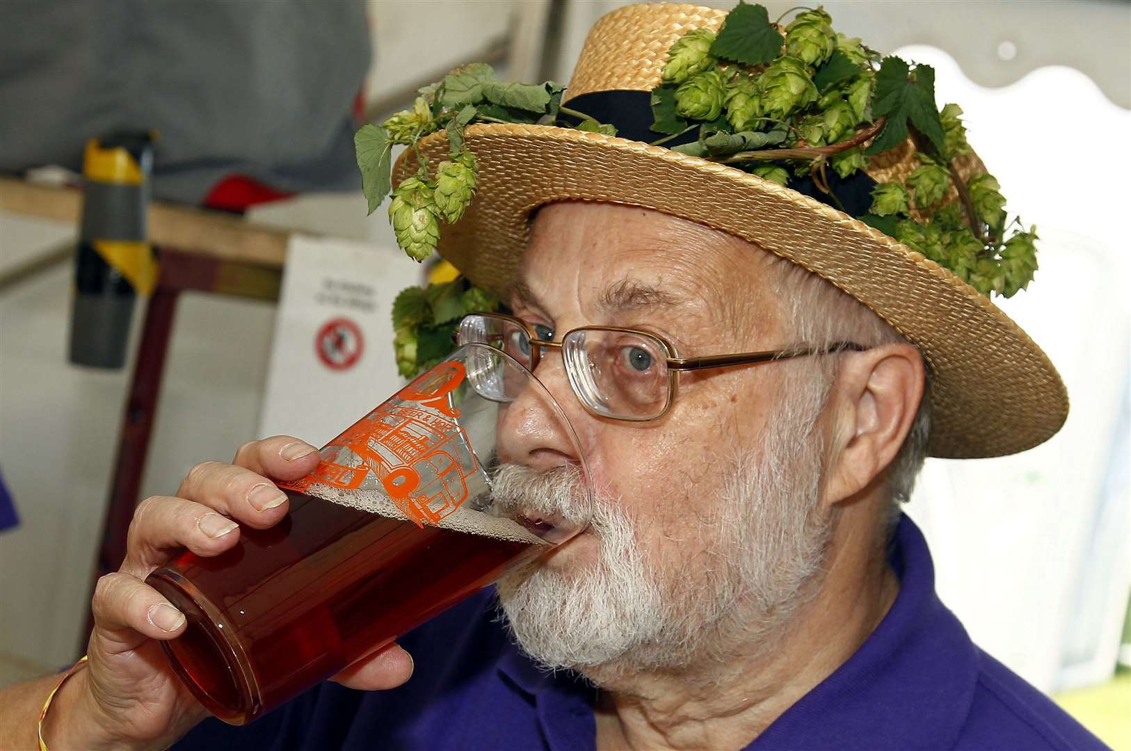 John Mills tries some ale at the festival at East Malling Research Centre last year Picture: Sean Aidan