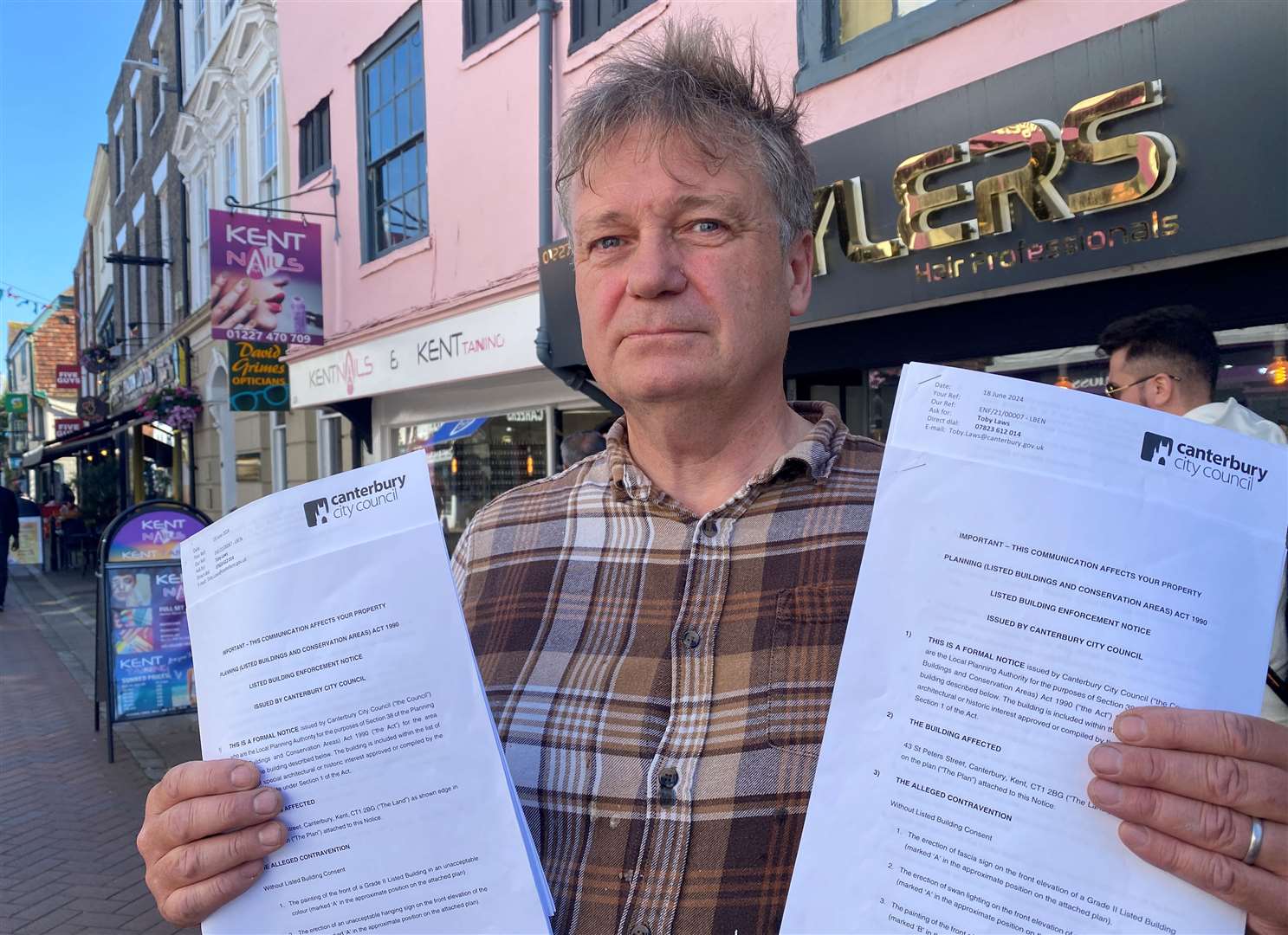 Christopher Nevill says he has been intimidated by heavy-handed communications by Canterbury City Council about his St Peter's Street properties