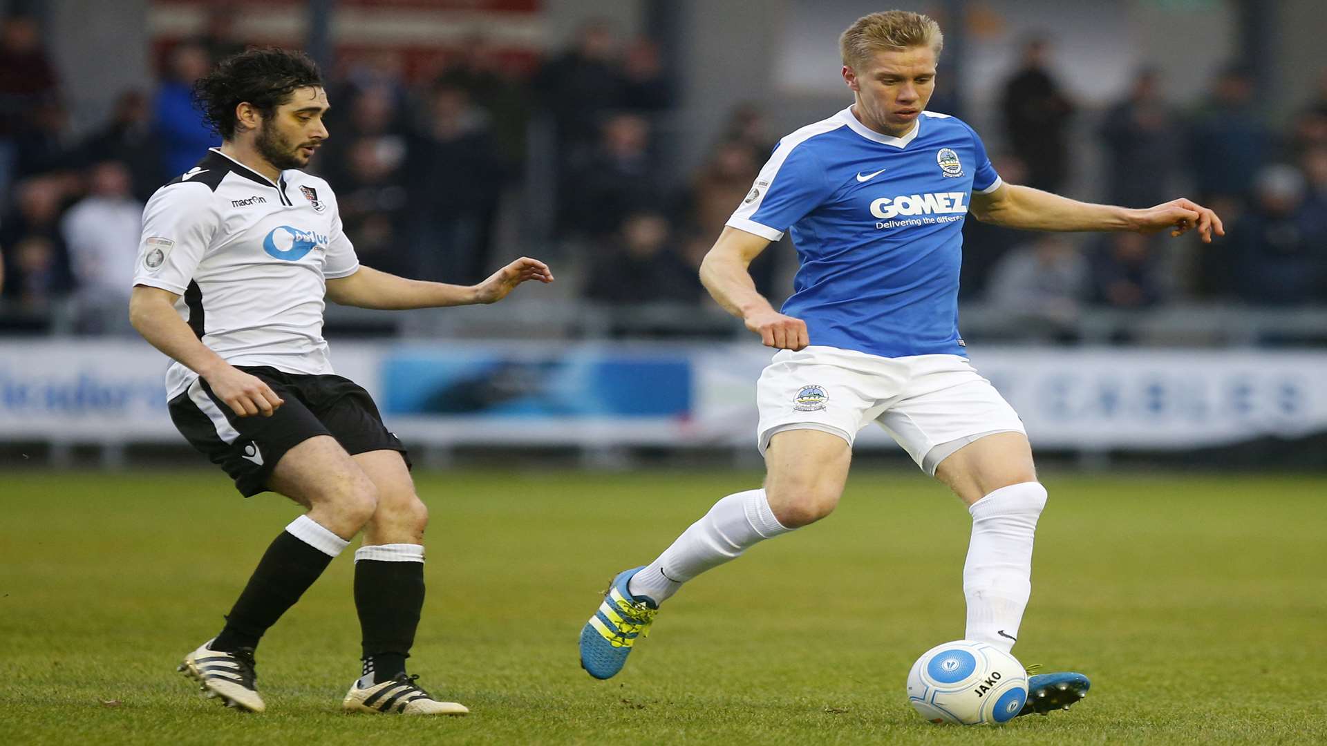 Dover's Jim Stevenson is closed down by Dartford's Alex Brown. Picture: Andy Jones