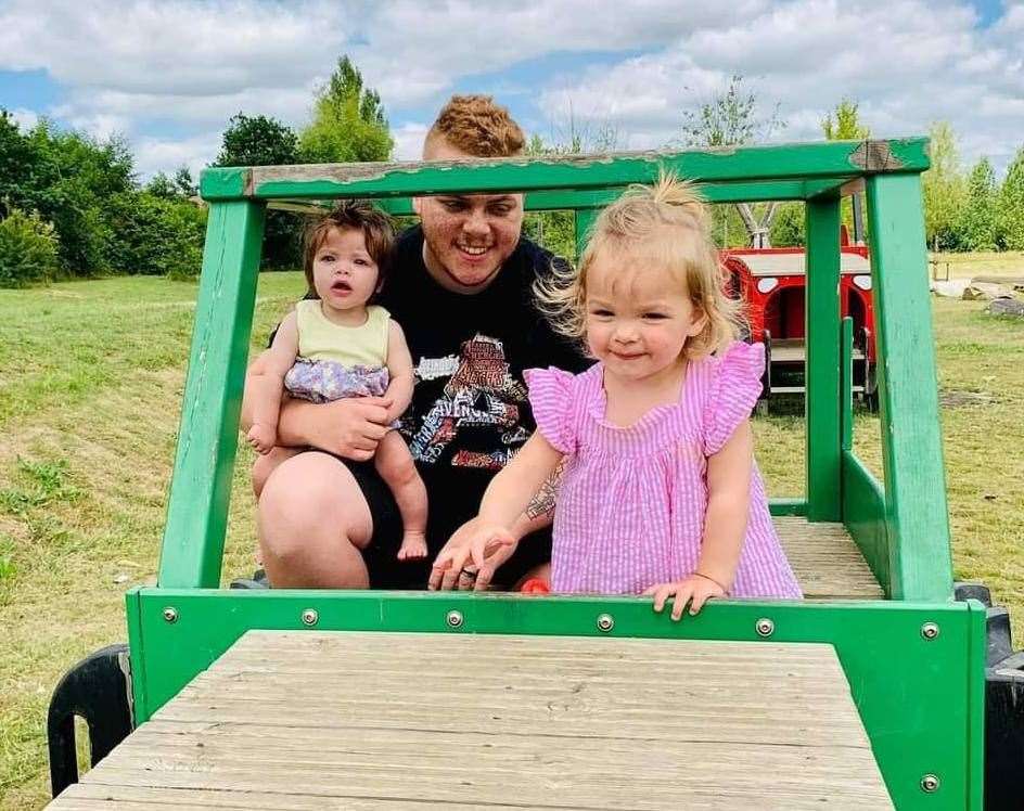 Ember with her dad and big sister at the park the weekend before the tragedy