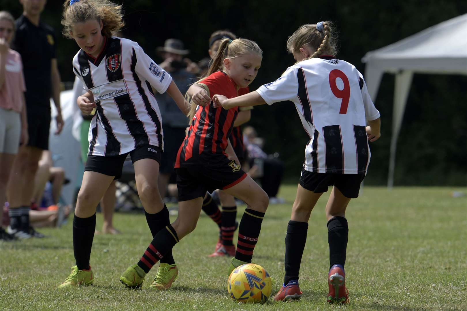 Liv Whitlock (in red and black) playing for Sittingbourne Ladies against Crayford Arrows Red U9. Picture: Barry Goodwin