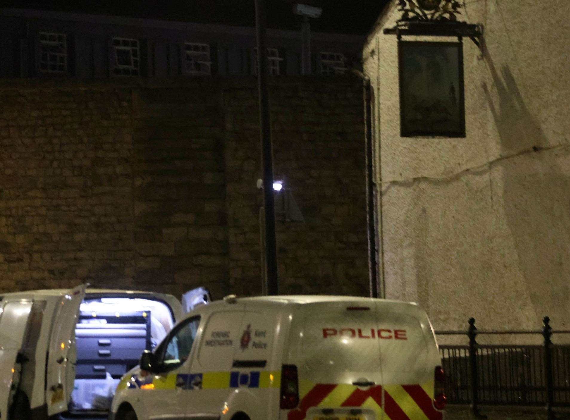 Police and forensics outside the Hare and Hounds pub in Maidstone. Picture: UKNIP