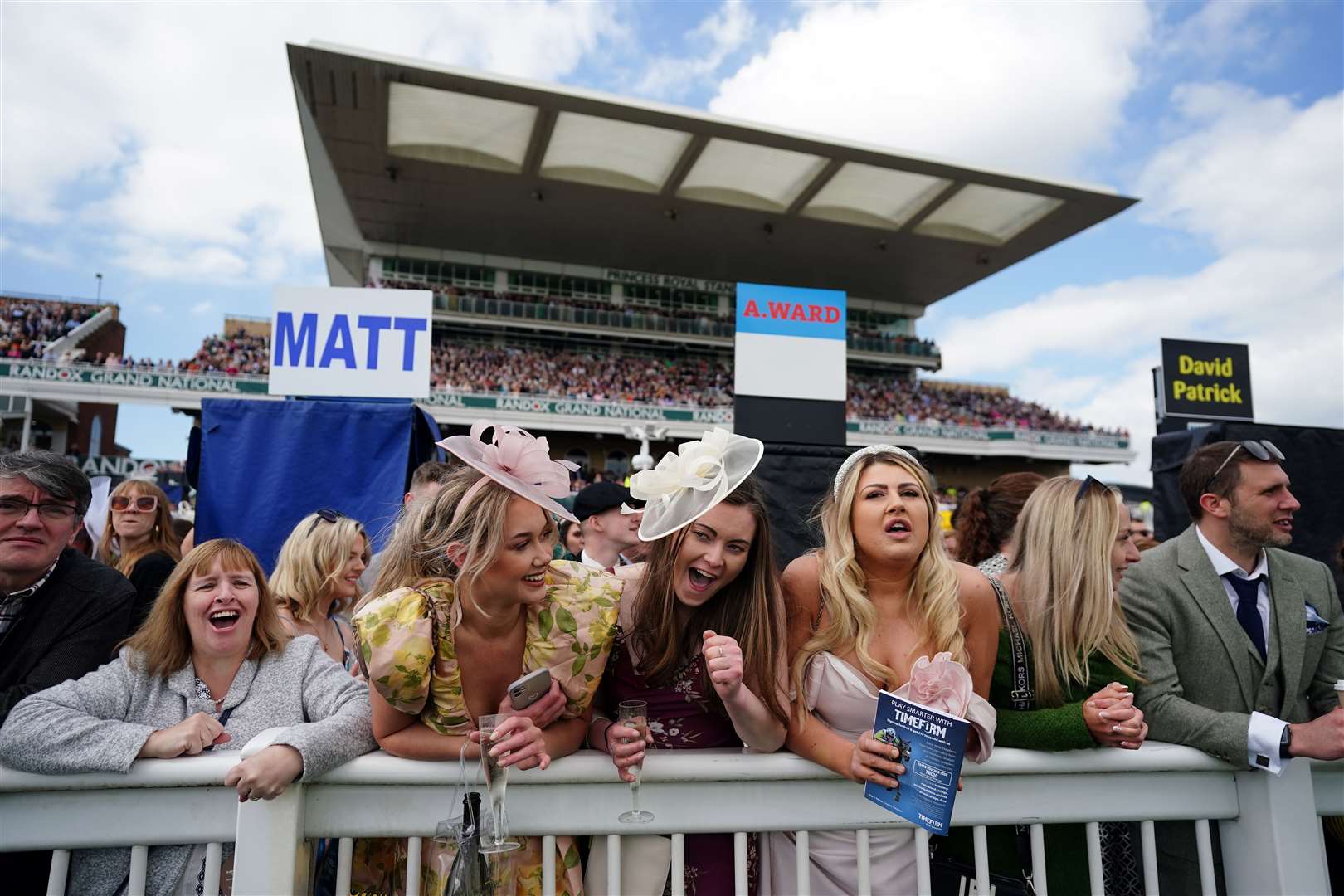 Racegoers on day three of the Randox Grand National Festival at Aintree Racecourse, Liverpool (David Davies for The Jockey Club/PA)