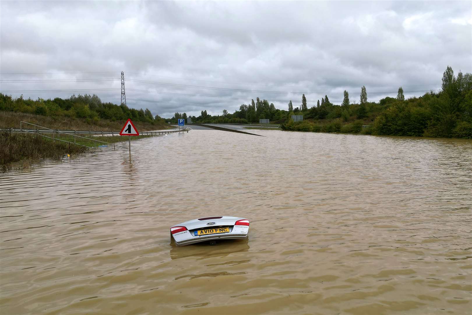 Flood water in Marston Moretaine, Bedfordshire (Joe Giddens/PA)