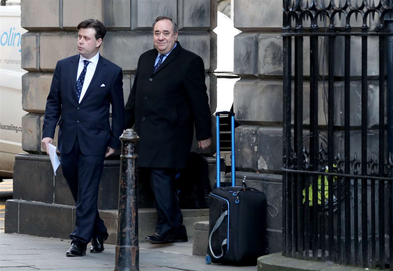 Solicitor David McKie (left) and Alex Salmond leave the Court of Session in Edinburgh (Jane Barlow/PA)