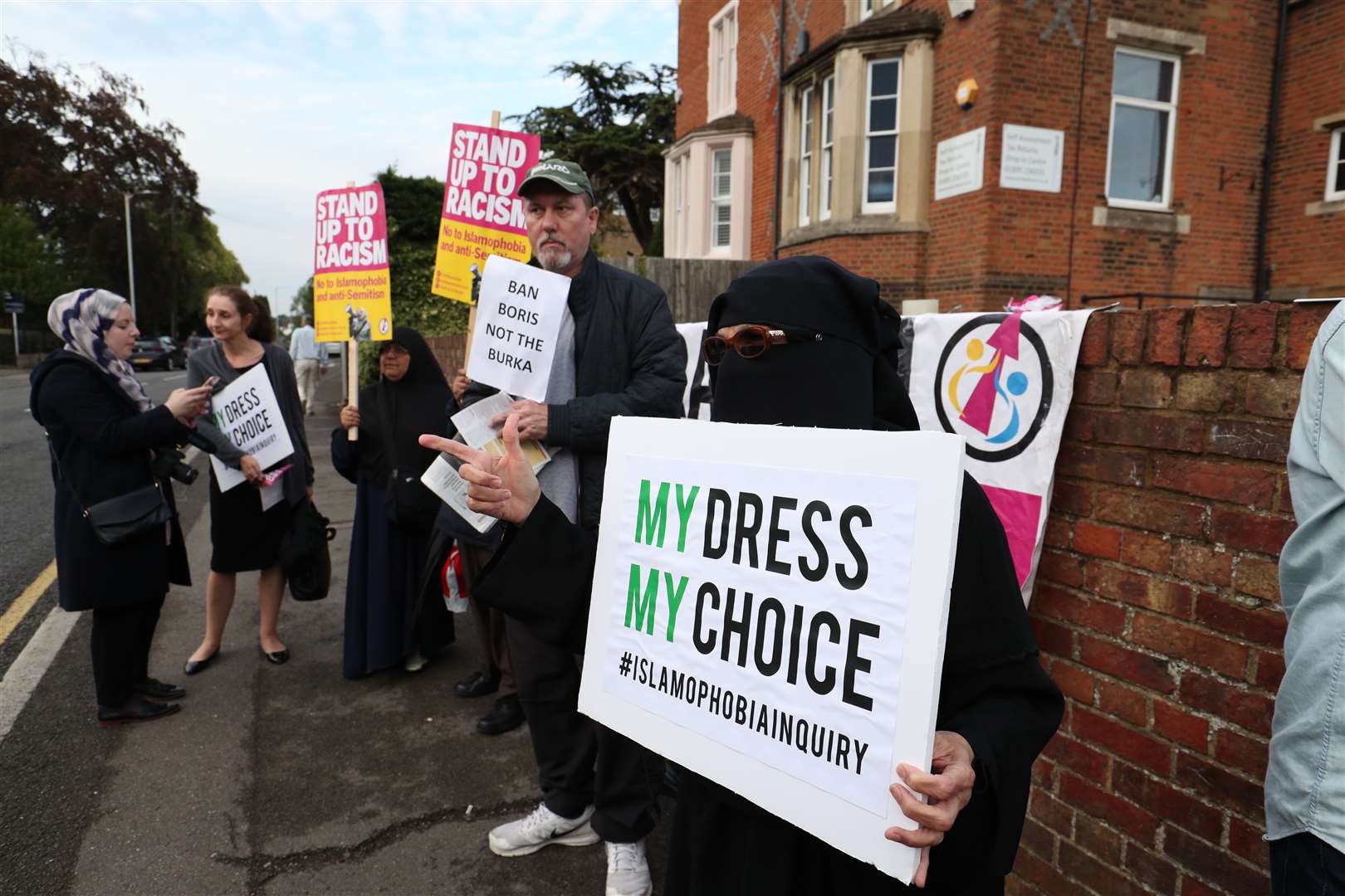 A woman wearing a burka at a protest near Boris Johnson’s Uxbridge and South Ruislip Conservative office (Jonathan Brady/PA)