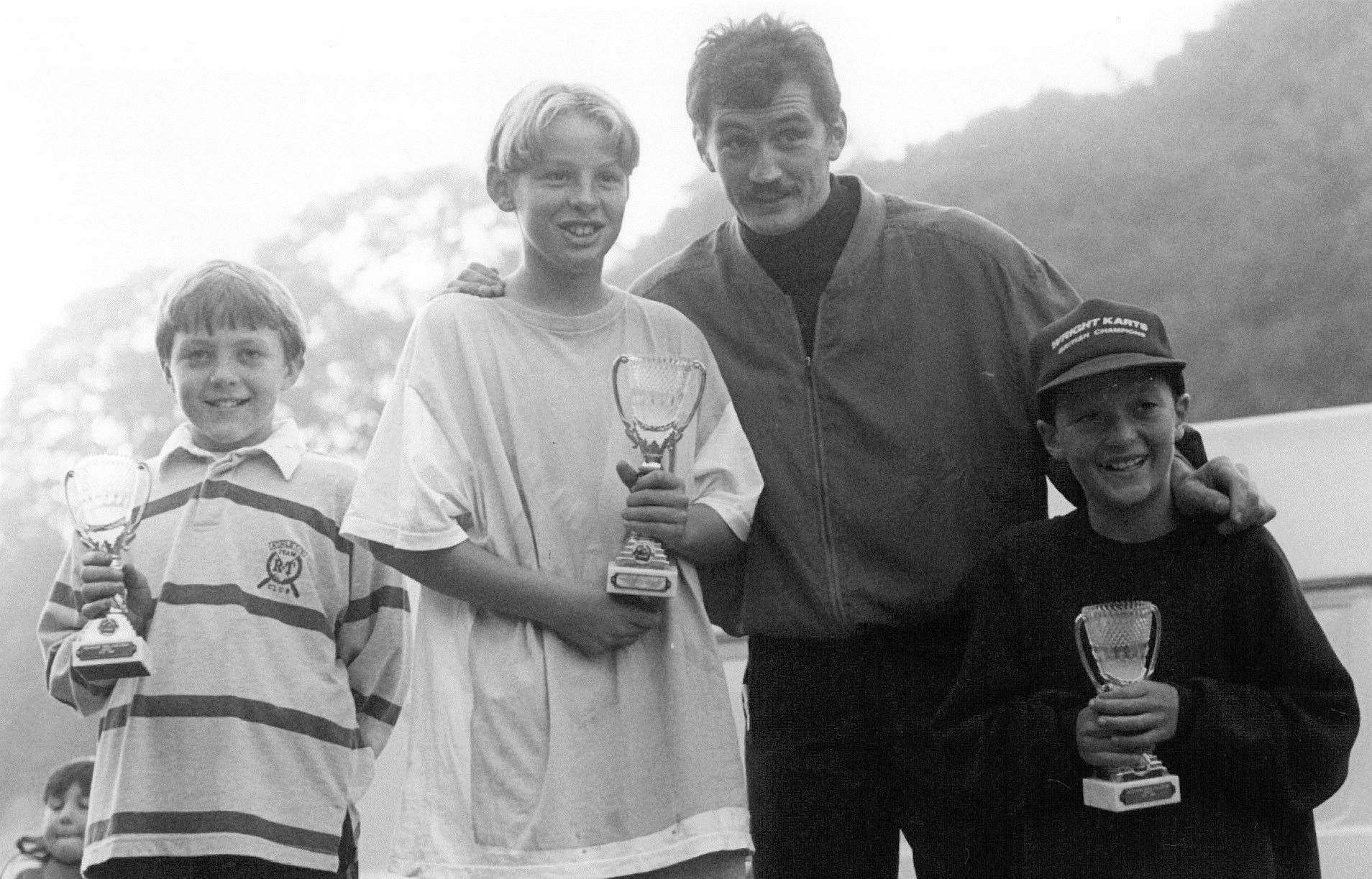 From left to right: Tom Sisley, Jenson Button, Barry McGuigan and James Wright on the podium for the 'O' Plate Championship in 1991