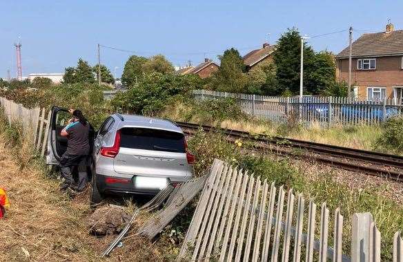 A Volvo has crashed into a metal railway fence off Brielle Way, Sheerness. Picture: Network Rail