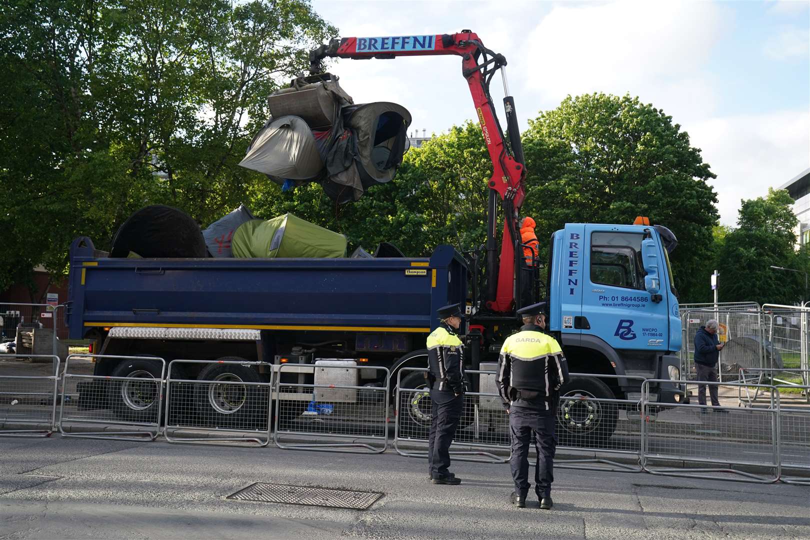 The tents were lifted onto a wagon (Brian Lawless/PA)