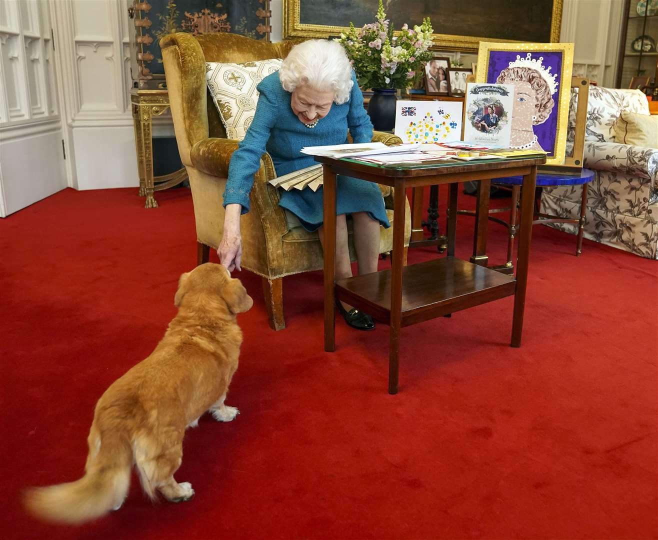 The Queen with dorgi Candy at Windsor Castle (Steve Parsons/PA)