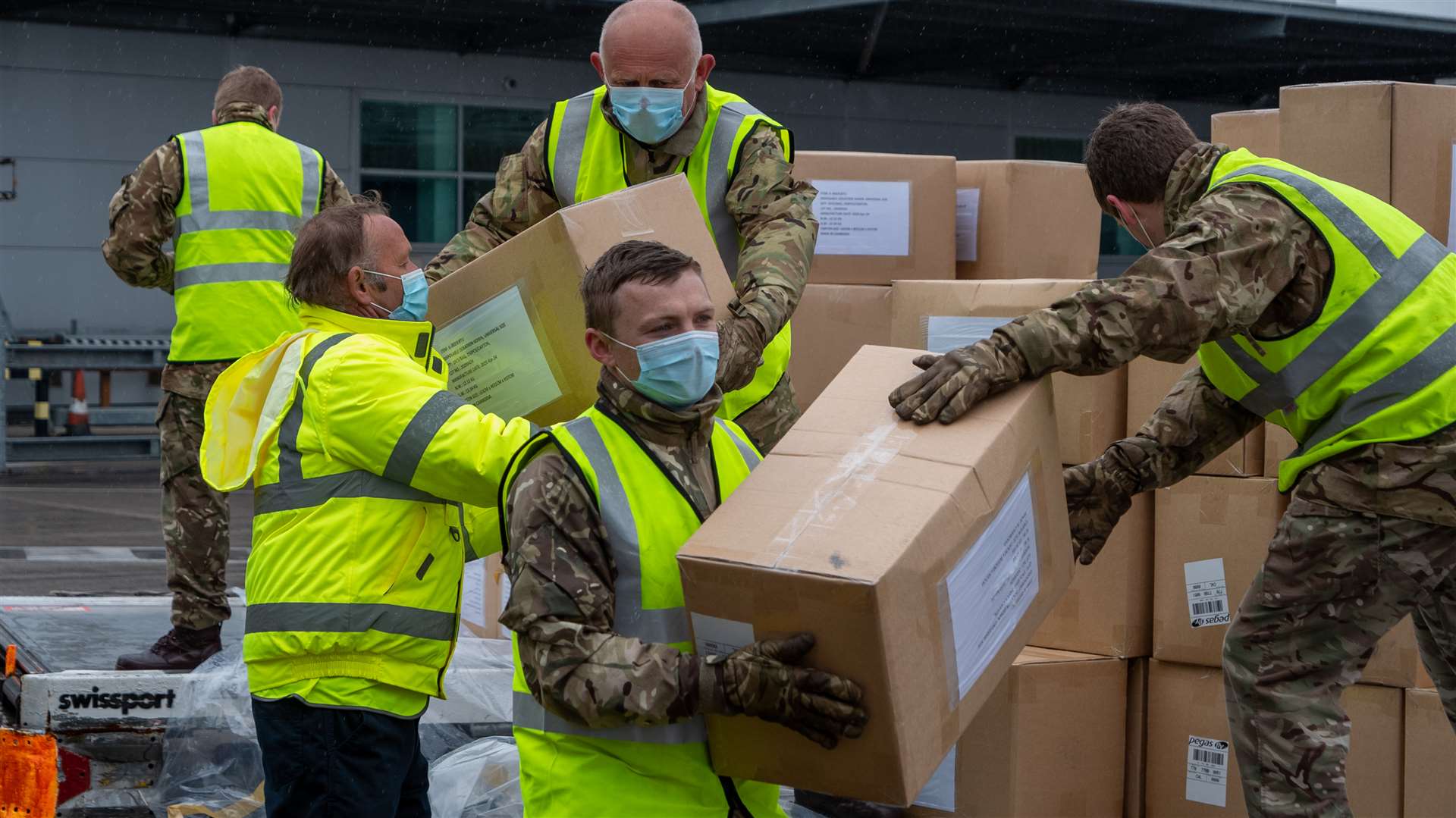 The supplies were unloaded by the military (Tomos Terfel/PA)