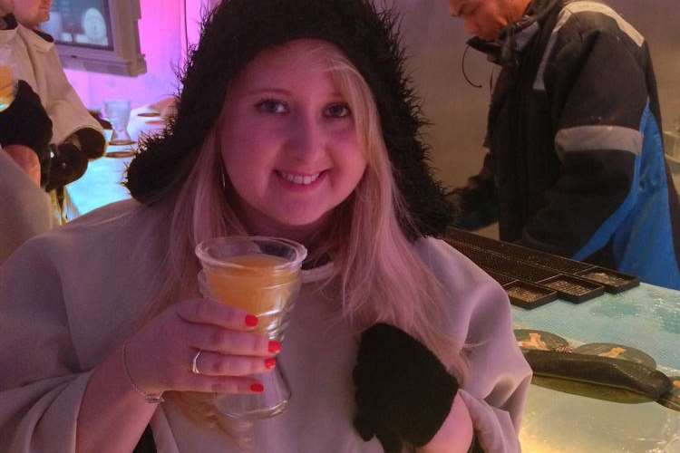 Reporter Sam Williams enjoying a frozen drink at The SVEDKA Ice Bar