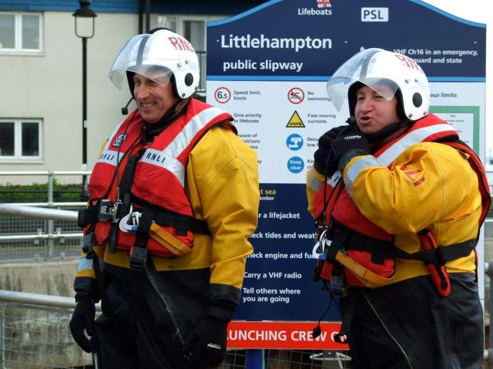 Andy Harris (left) and fellow helm Ivan Greer (right) in full lifesaving kit prepare for a training session pre-Covid (RNLI/PA)