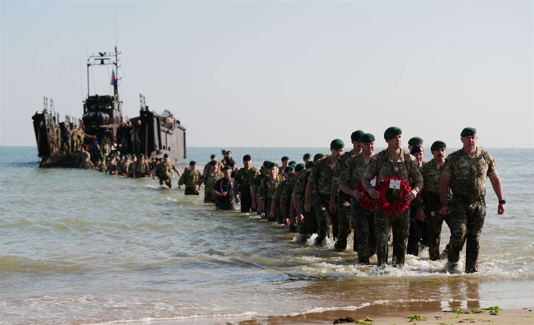 A beach landing by the Royal Marines of 47 Commando at Asnelles before their annual ‘yomp’ to Port-en-Bessin, in Normandy, to commemorate the 80th anniversary of the D-Day landings (Aaron Chown/PA)