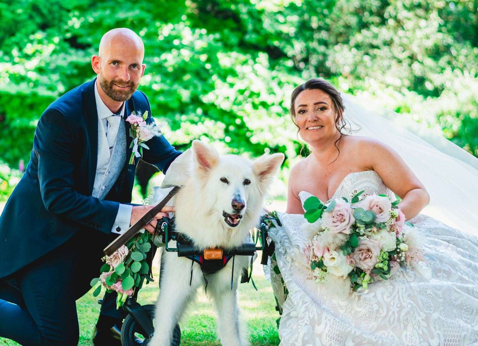 Richard Smith and Belinda Smith, with their dog Luni, at their wedding in June 2023. Picture: Dan Miles Photography