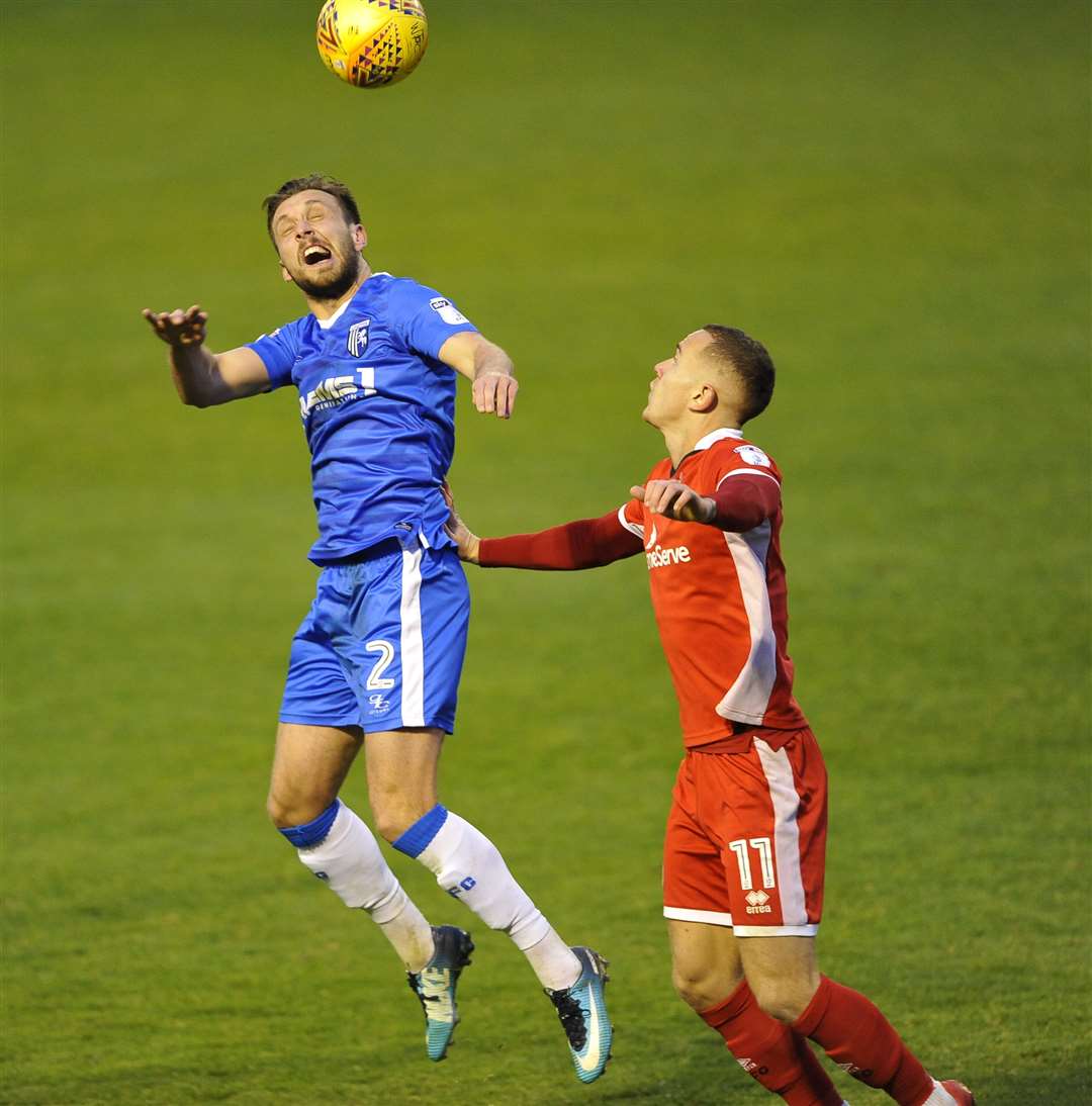 Luke O'Neill wins a header Picture: Ady Kerry