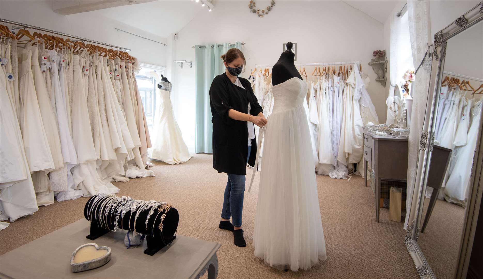 Mel Heel in her wedding dress boutique Bridal Reloved in Leicester (Joe Giddens/PA)