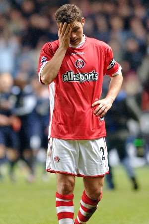 Addicks skipper Luke Young shows his disappointment at the final whistle. Picture by MATTHEW WALKER