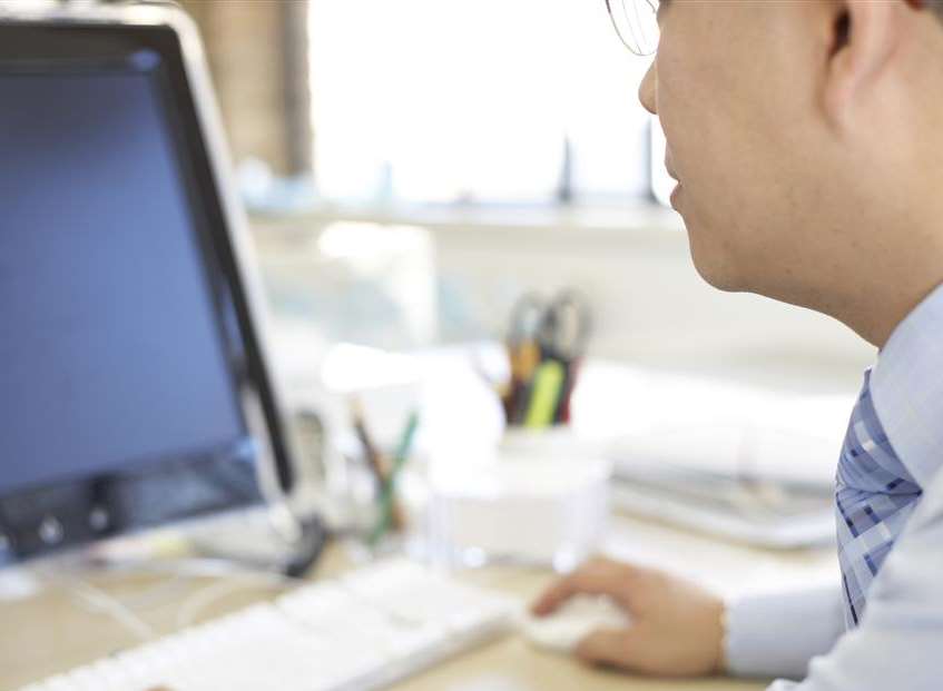 A man working at a computer