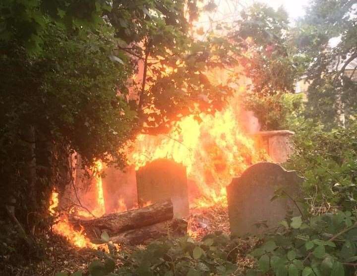 The graveyard at St Peter and St Paul's Church in Tonbridge was spotted ablaze. Picture: Kelvin Webster