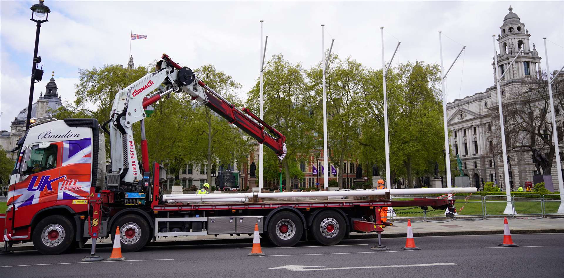 Flagpoles were erected in Parliament Square ahead of the traditional State Opening of Parliament (Aaron Chown/PA)