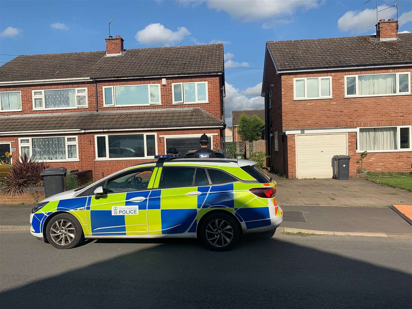 Police at the scene in Kidderminster, after David Louden and his three-year-old son Harrison were found dead (Josh Payne/PA)