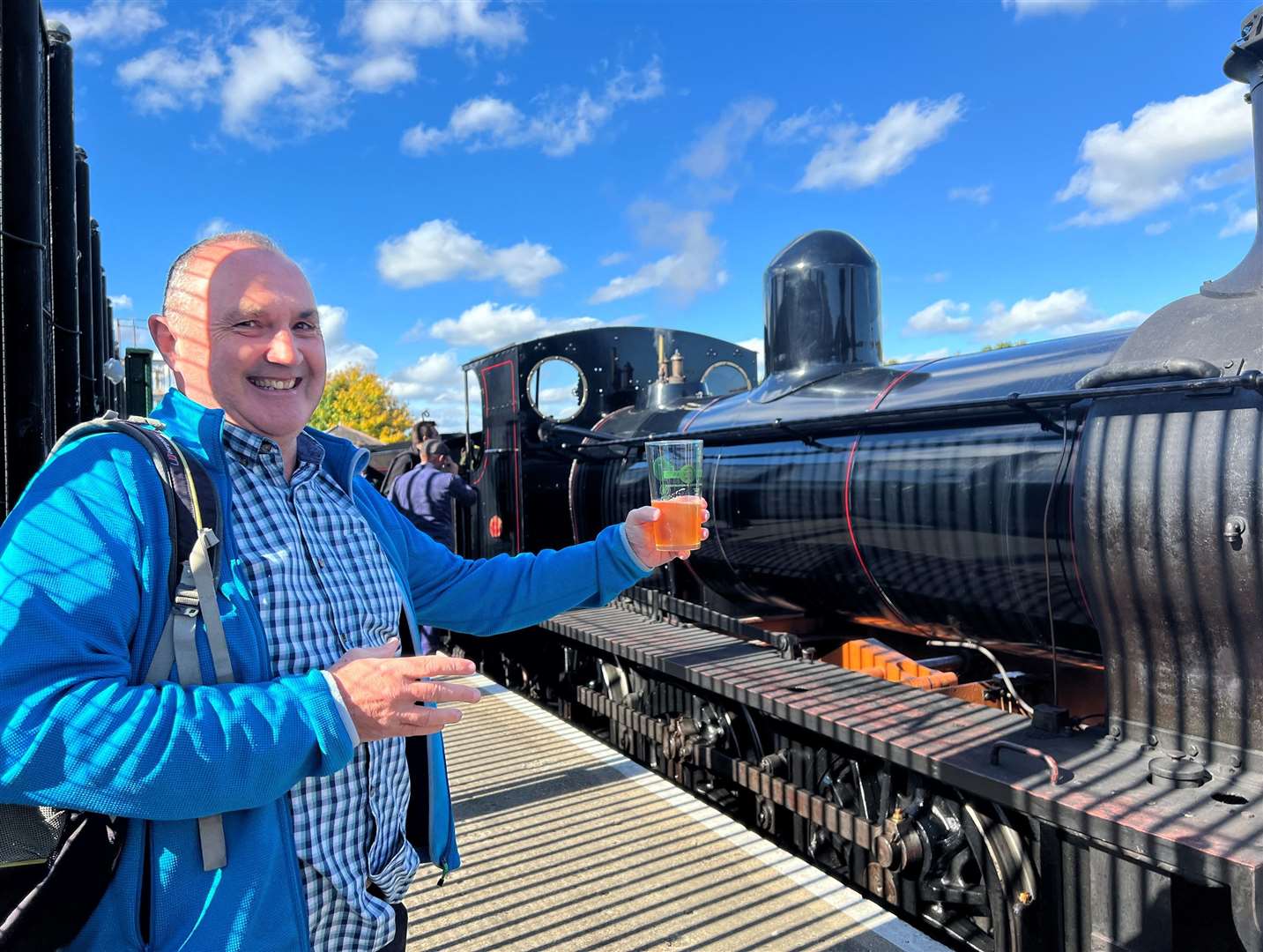 Cheers! A happy visitor to Tunbridge Wells West Station