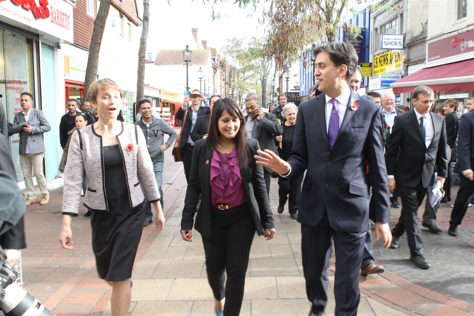 Yvette Cooper, Shadow Home Secretary, Naushabah Khan, Labour's Parliamentary Candidate and Labour leader, Ed Miliband walk about in Chatham High Street