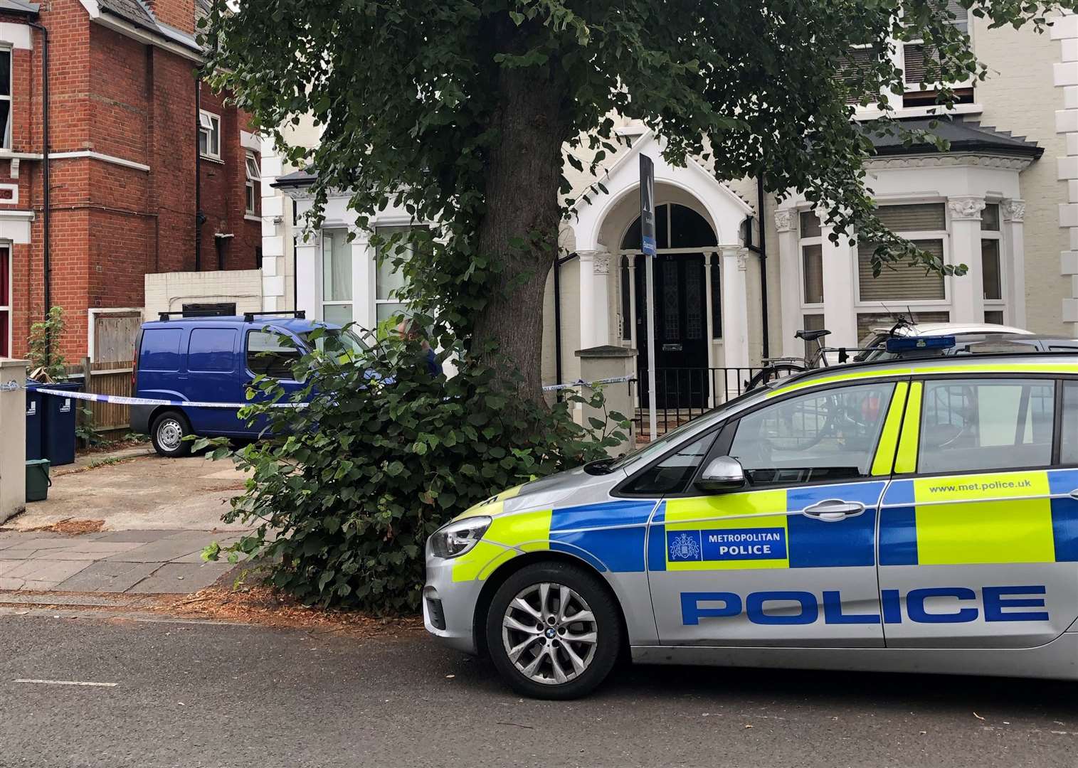 Police outside the house in Cumberland Park, Acton, west London, where Dylan Freeman was killed by his mother, Olga (Thomas Hornall/PA)