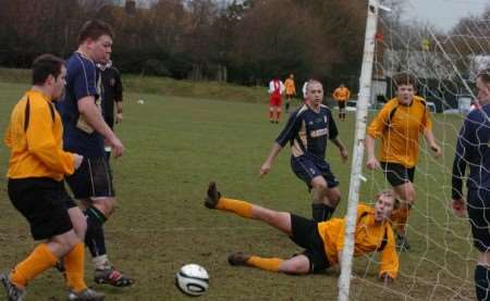 Kings Head United (blue) were beaten heavily by Towns Club in Division 2