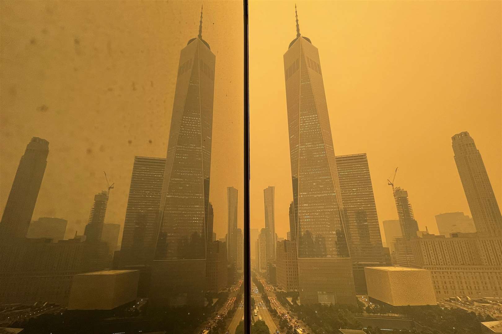 Smoke from the Canadian wildfires blanketed New York City while pouring more carbon into the atmosphere (Andy Bao/AP)