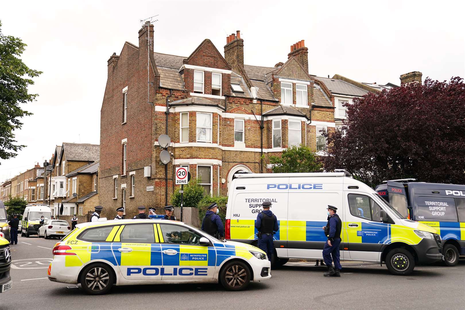 Police vehicles in Brixton, south-west London (Aaron Chown/PA)