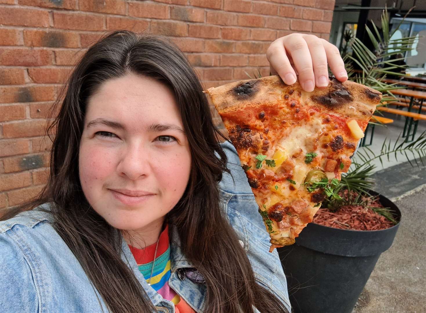 Palms Pizzeria, where the slices are as big as your head