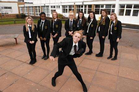 Belle Fisher performing for fellow pupils at Herne Bay High School