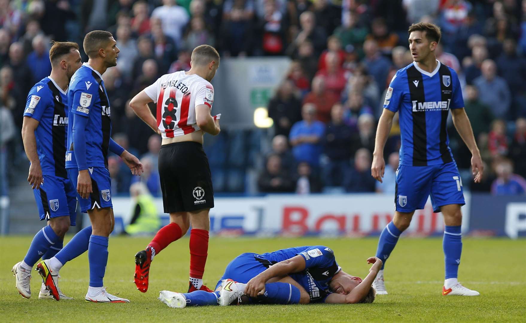 Referee Lee Swabey shows Sunderland's Elliot Embleton a red card for a tackle on Jack Tucker. Picture: Andy Jones