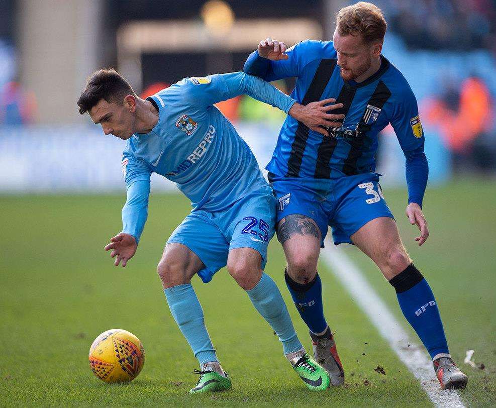 Connor Ogilvie challenges for the ball Picture: Ady Kerry