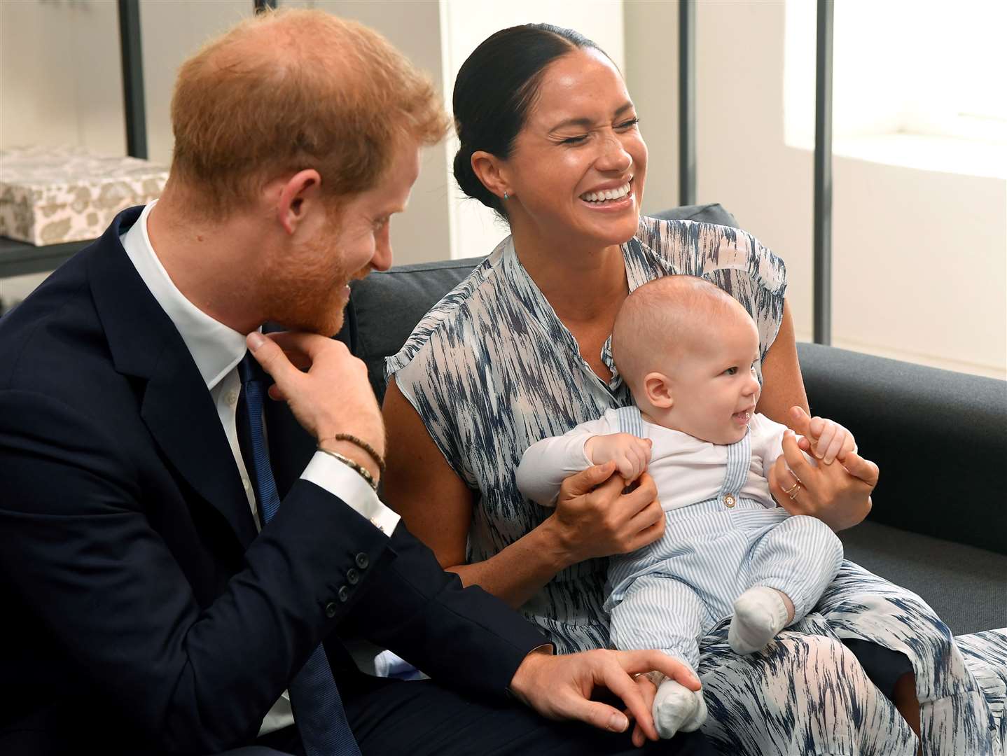 Harry and Meghan with Archie in South Africa (Toby Melville/PA)