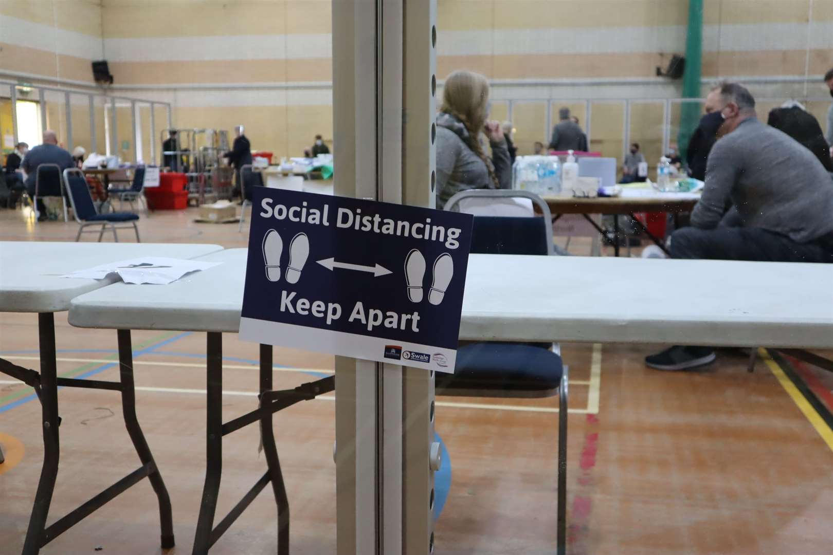 Inside the KCC election count at Swallows Leisure Centre, Sittingbourne, with giant Perspex screens protecting the counters to comply with Covid regulations