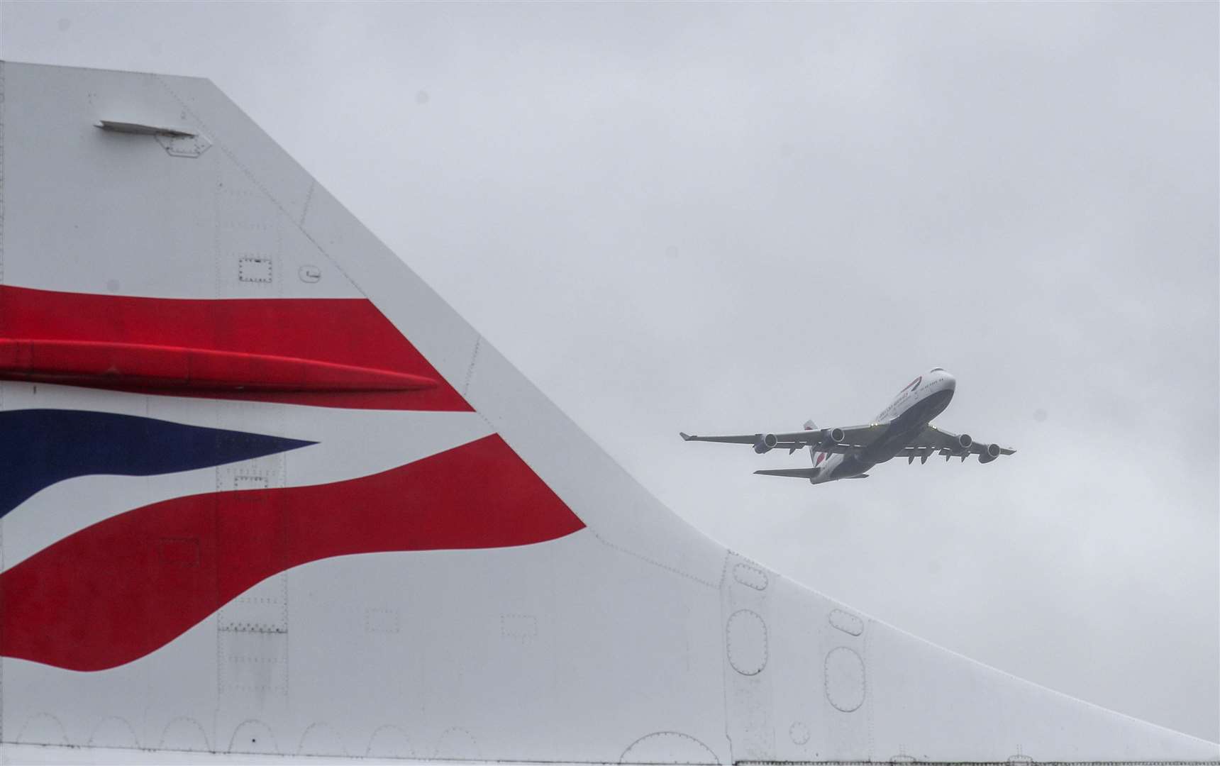 Aircraft G-CIVY, one of the last two British Airways Boeing 747-400 aircraft, conducts a fly past after its final departure from Heathrow Airport, London (Steve Parsons/PA)