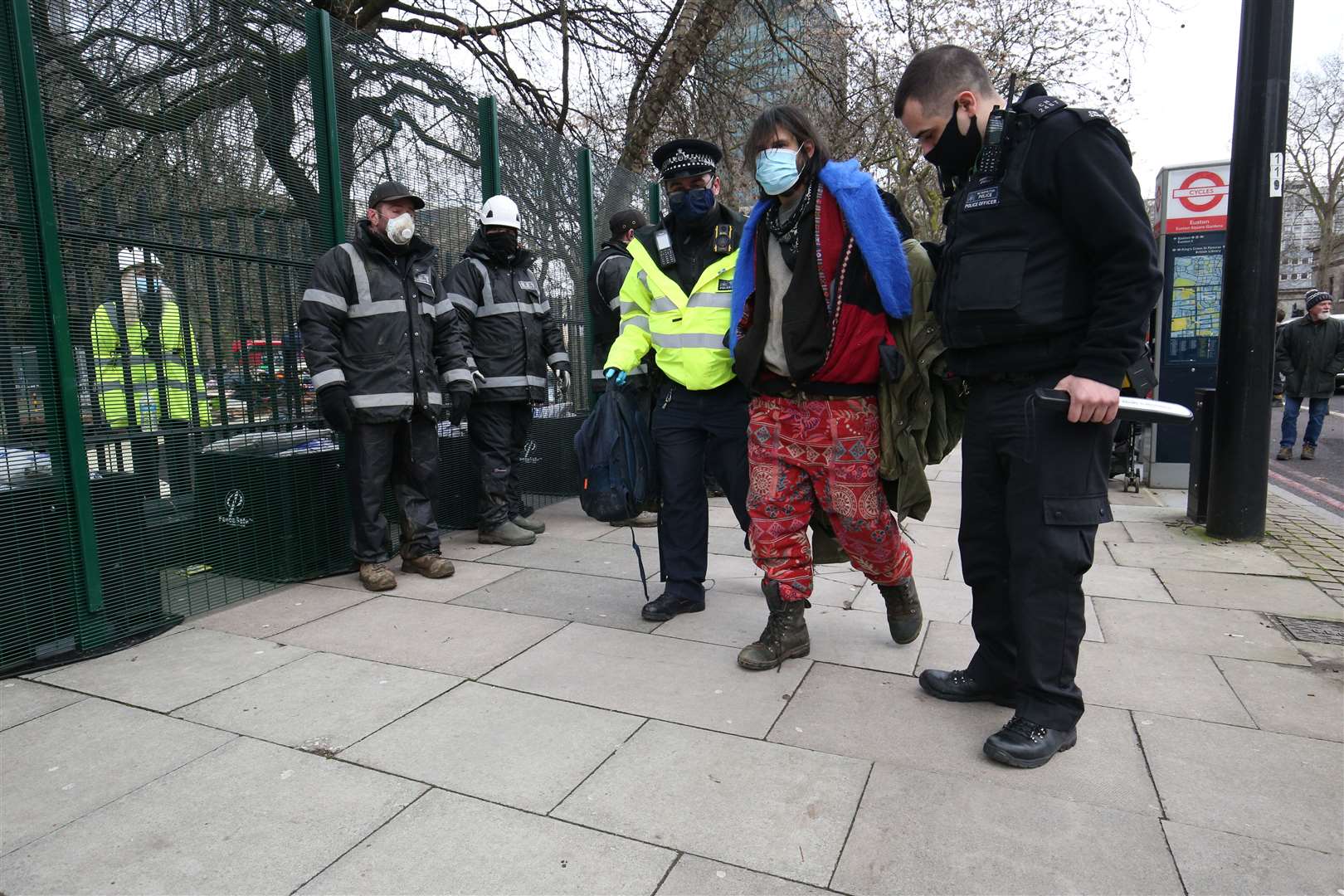 An HS2 Rebellion protester is arrested by police after being removed from a tree (Jonathan Brady/PA)