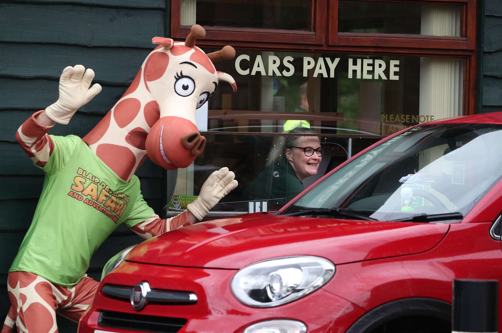 It was a wet start to the morning – but there was a warm welcome in store (Andrew Milligan/PA)